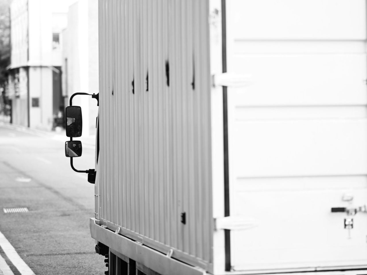 Refrigerated delivery truck on a city street